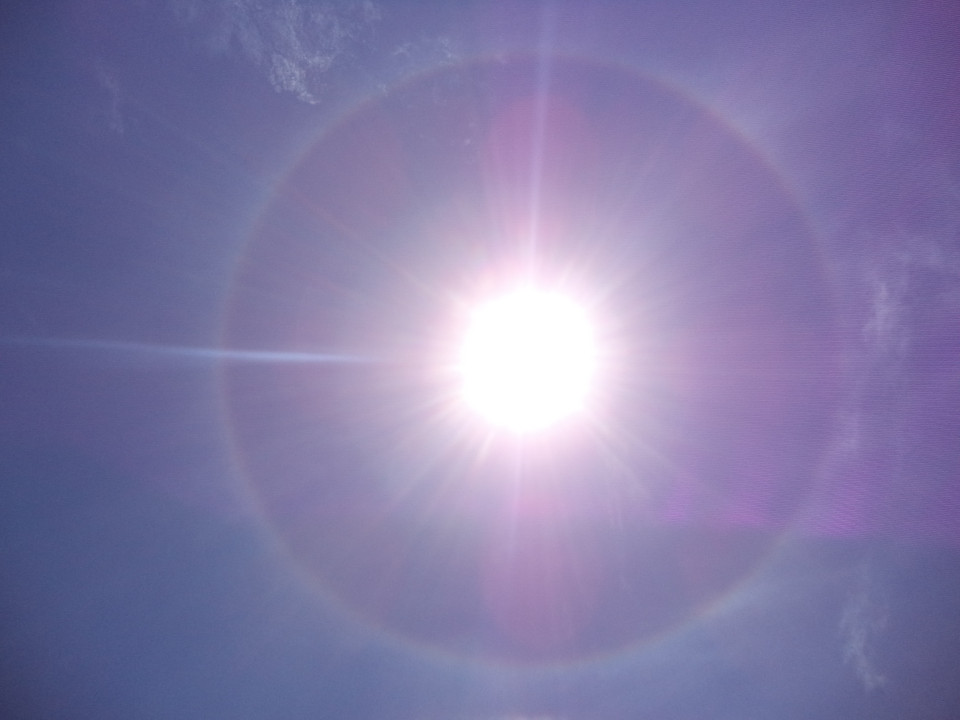 Solar Halo. When the ice around the sun reflects its light - like a rainbow.